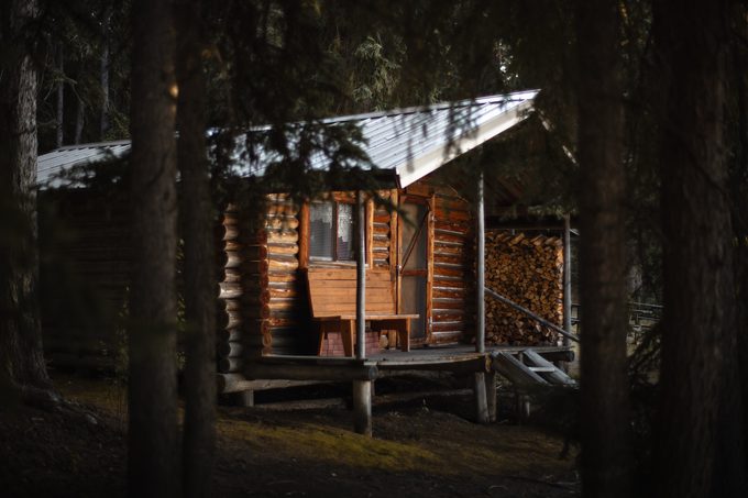 The cabin through the trees at Eagle's Nest Resort.