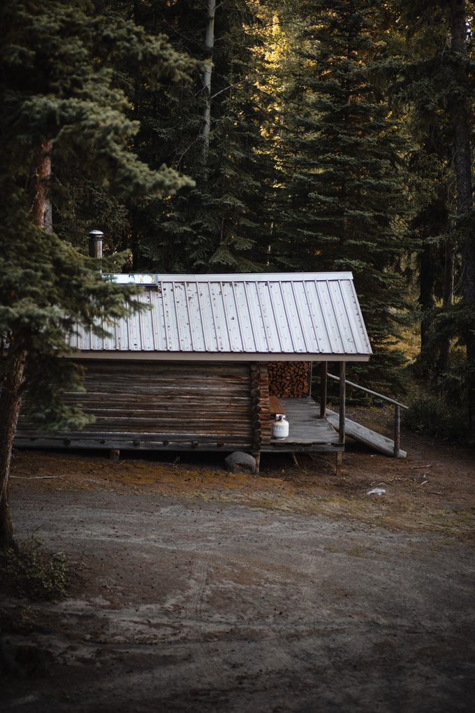 The cabin among the spruce at Eagle's Nest Resort.